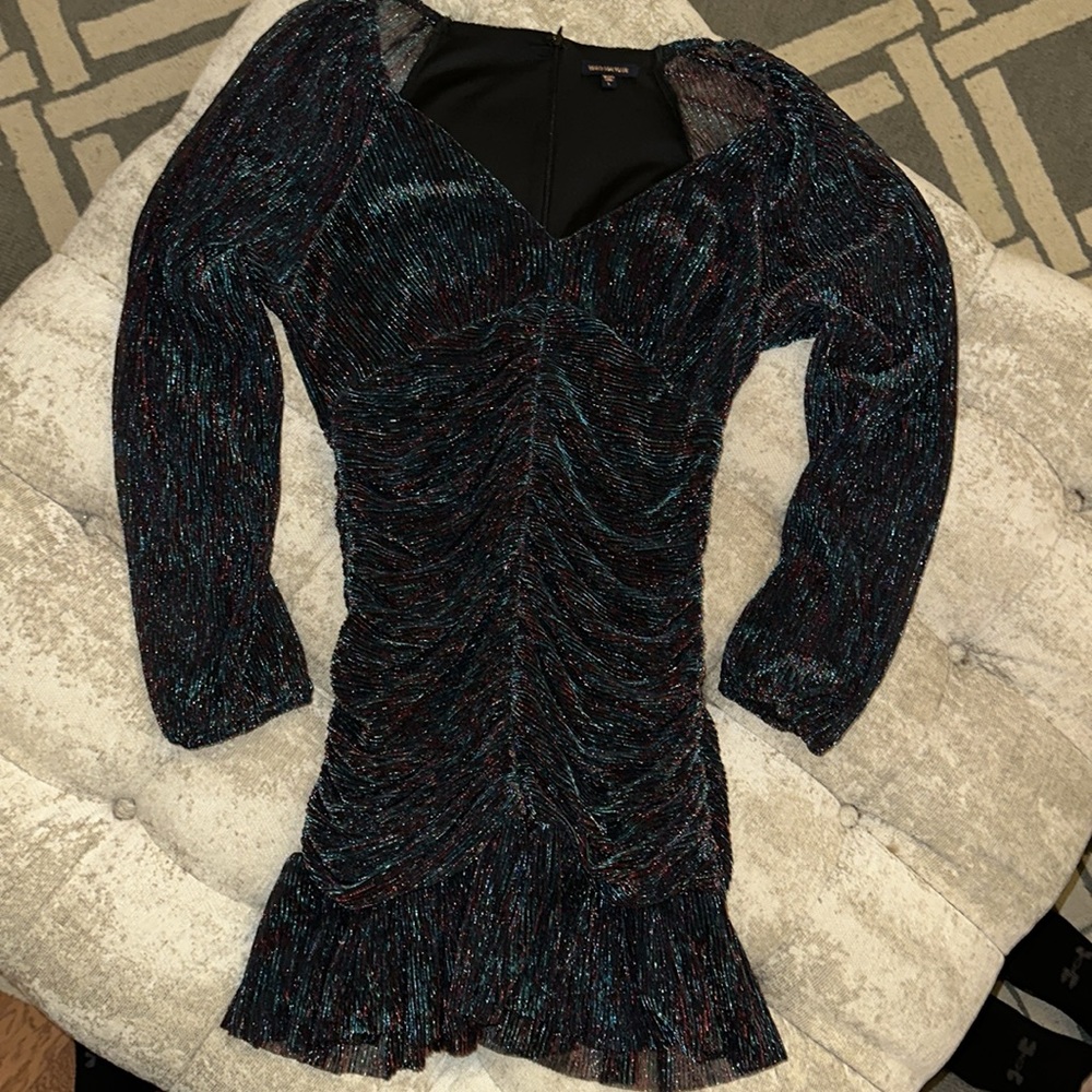Skies are blue long sleeve dress very flattering.